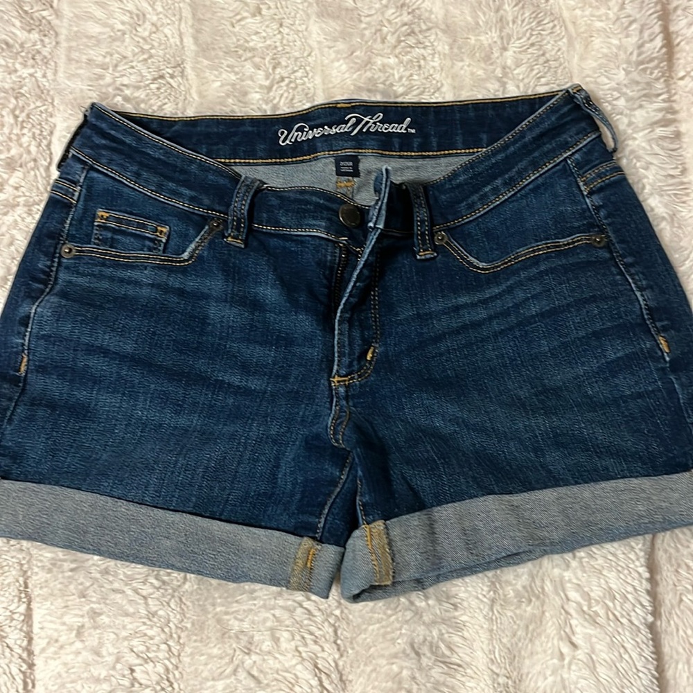 Mid rise dark wash shorts